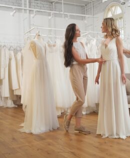 A Bride-To-Be shopping for a wedding dress in a Bridal Boutique. High quality photo